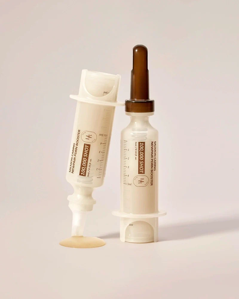 HEVEBLUE Salmon Caring Newpair PDRN Booster 100,000 Shot Essence - Image 2