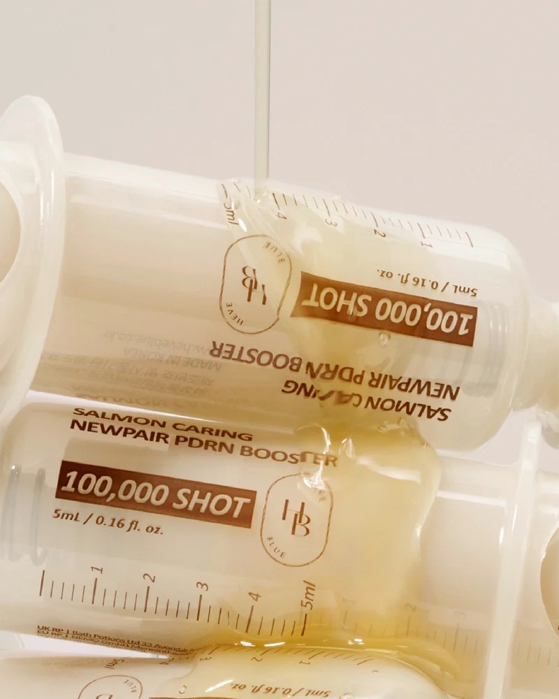 HEVEBLUE Salmon Caring Newpair PDRN Booster 100,000 Shot Essence - Image 3